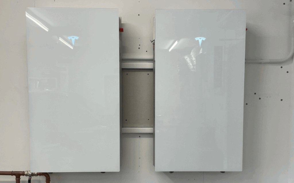 Two Tesla Powerwalls on wall